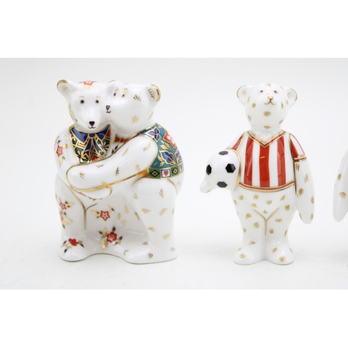 225 - Four Royal Crown Derby miniature bear paperweight, Footballer (Red and White stripes), Footballer (B... 