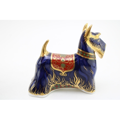 228 - A Royal Crown Derby paperweight, Scottish Terrier, 13cm long, gold stopper, red printed marks and Ro... 