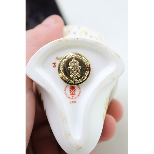 230 - A Royal Crown Derby paperweight, Puffin, date code for 1999 (LXII), gold stopper and red Royal Crown... 