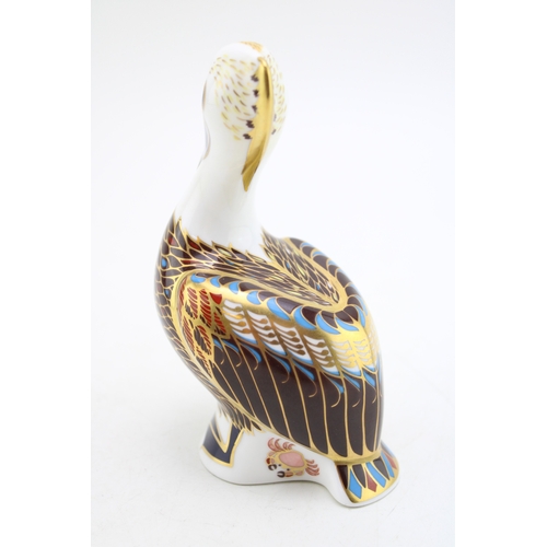 240 - A Royal Crown Derby paperweight, Brown Pelican, 13cm high, gold stopper, red printed marks and Royal... 