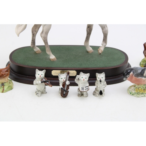 253 - Beswick to include a Desert Orchid on base (Doulton backstamp) with four birds and the Cat Chorus ba... 