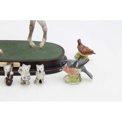 253 - Beswick to include a Desert Orchid on base (Doulton backstamp) with four birds and the Cat Chorus ba... 