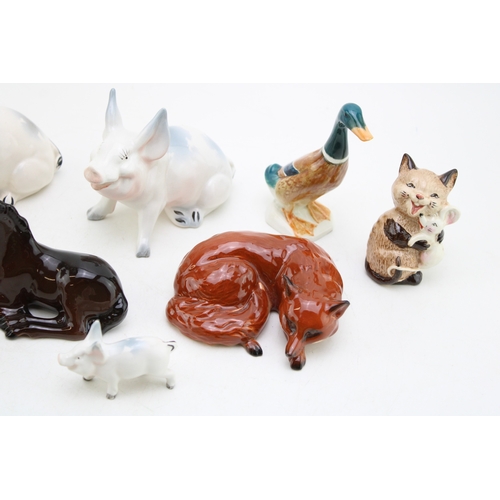 254 - Beswick animals to include a comical pig family, a blue tit, a laughing cat with mouse and others (Q... 