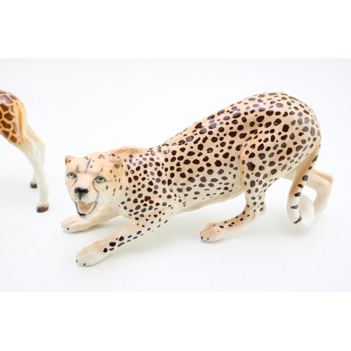 258 - A Beswick leopard with a baby giraffe (2).