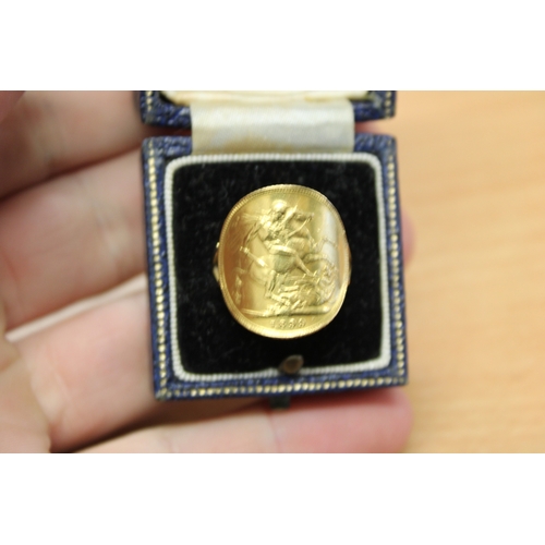 8 - 1899 FULL 22ct sovereign ring of curved form, the additional shank marked 9ct.  Gross weight 9g.