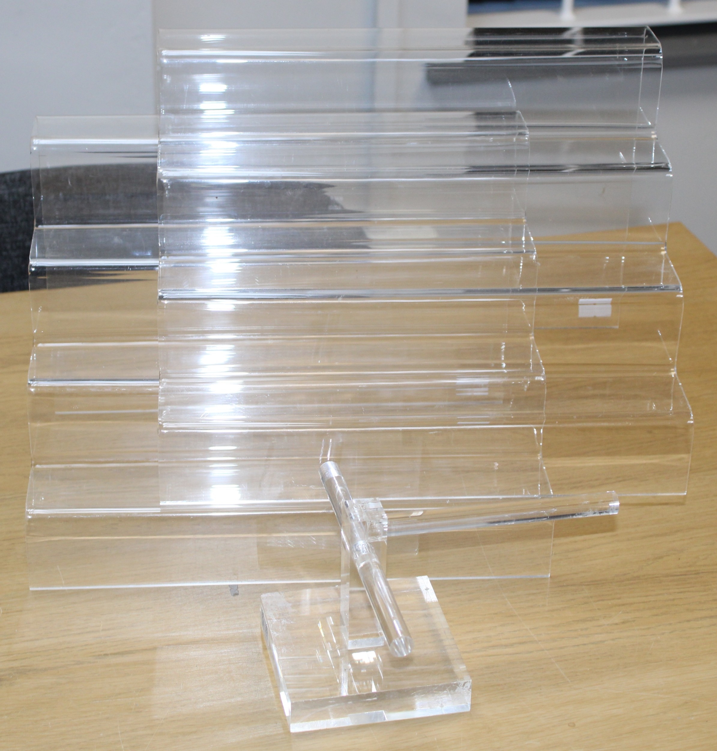 Shop display graduated perspex stepped shelves together with a perspex ...