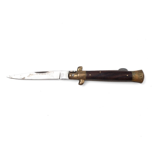323 - A mid 20th century folding lock knife, made in Italy, in the form of a dagger, blade 7.5cm long, tot... 