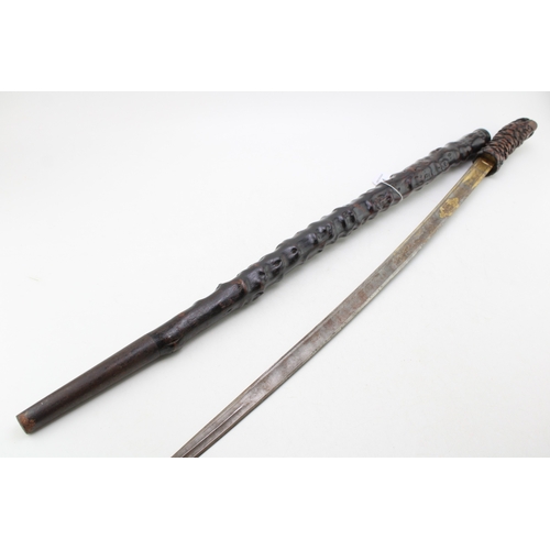 1 - A Impressive Late 19th Century Sword Stick with Finely Carved Black Forest Style Handle in the form ... 