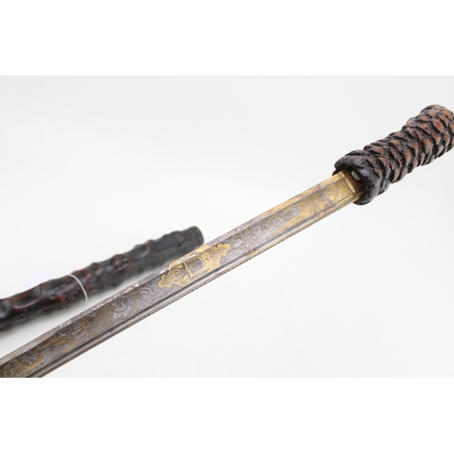 1 - A Impressive Late 19th Century Sword Stick with Finely Carved Black Forest Style Handle in the form ... 