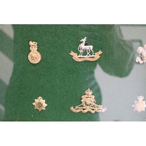 15 - A Framed Collection of British Army Cap Badges including Suffolk, Herefordshire, Royal Warwickshire,... 