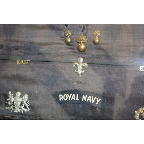 16 - A Framed Collection of British Army Cap Badges Including a Victorian North Staffordshire 1st Volunte... 