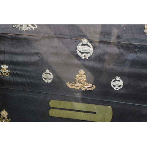 16 - A Framed Collection of British Army Cap Badges Including a Victorian North Staffordshire 1st Volunte... 