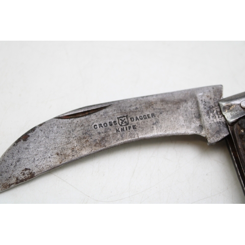 219 - An antique flat cap pruner pocket knife, Sheffield made, makers mark rubbed, blade stamped 'Cross Da... 