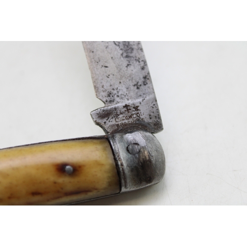 221 - Lockwood Brothers flat cap pruner pocket knife with stag handles, blade 7cm, total length 17.5cm.