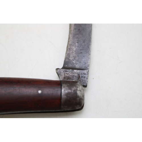 224 - A Johnson Western of Sheffield flat cap pruner pocket knife, wooden handles, stamped to blade, some ... 