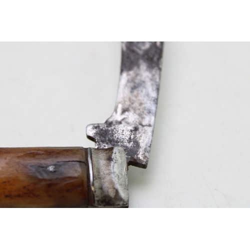 225 - An antique flat cap pruner pocket knife, stag antler, 6.5cm blade, 18cm long.
