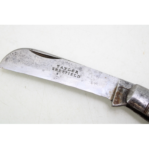 226 - A Taylor of Sheffield antique flat cap pruner pocket knife, blade 7cm, 19cm total length.