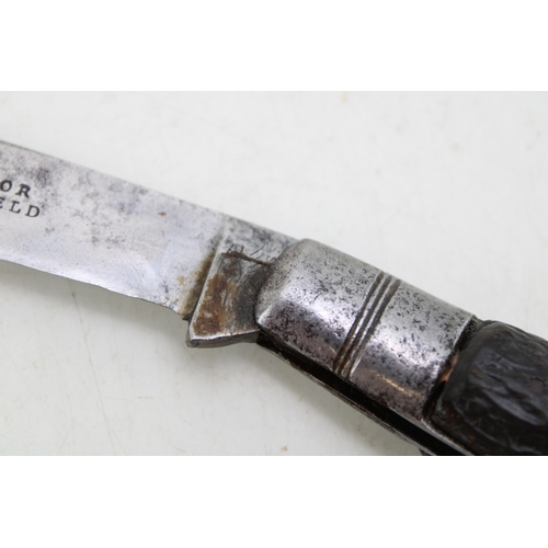 226 - A Taylor of Sheffield antique flat cap pruner pocket knife, blade 7cm, 19cm total length.