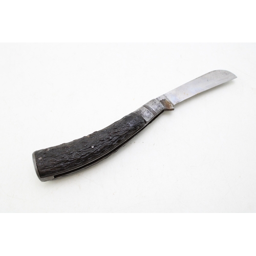 226 - A Taylor of Sheffield antique flat cap pruner pocket knife, blade 7cm, 19cm total length.