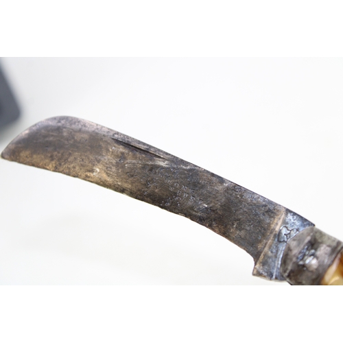 227 - A substantial flat cap pruner pocket knife, with stag antler handle, blade stamped with name and ket... 