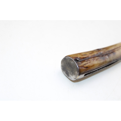 227 - A substantial flat cap pruner pocket knife, with stag antler handle, blade stamped with name and ket... 