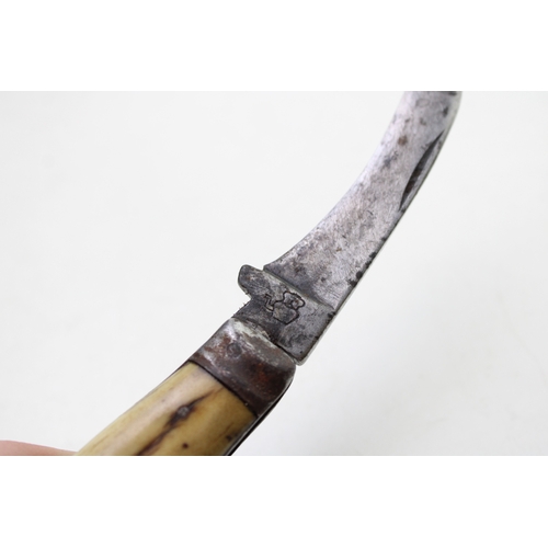 229 - An antique flat cap pruner pocket knife with stag antler handle, kettle engraved to blade, blade 7cm... 