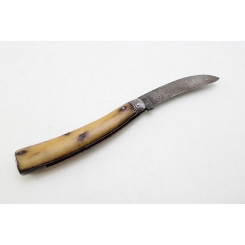 230 - An antique flat cap pruner pocket knife with antler handle, unmarked, blade 7.5cm, 19.5cm in total.