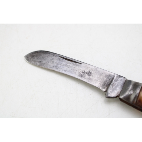 237 - An antique Sheffield-made flat cap pruning pcoket knife, stag antler handle, 7cm blade, 18cm in tota... 