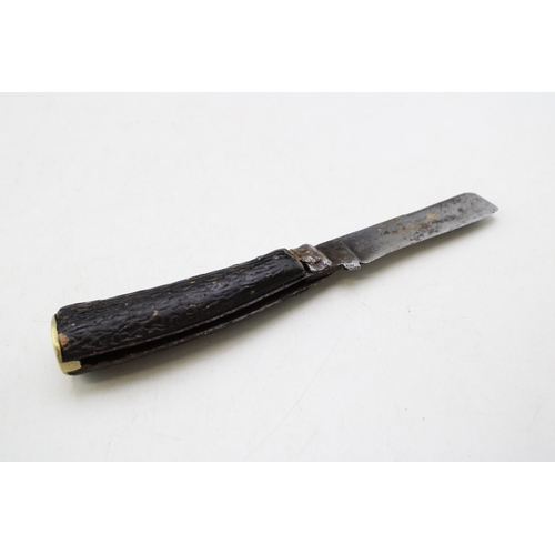240 - A Parkin & Marshall Sheffield made flat cap pocket knife, antler handle, blade 6.5cm long, 17cm in t... 