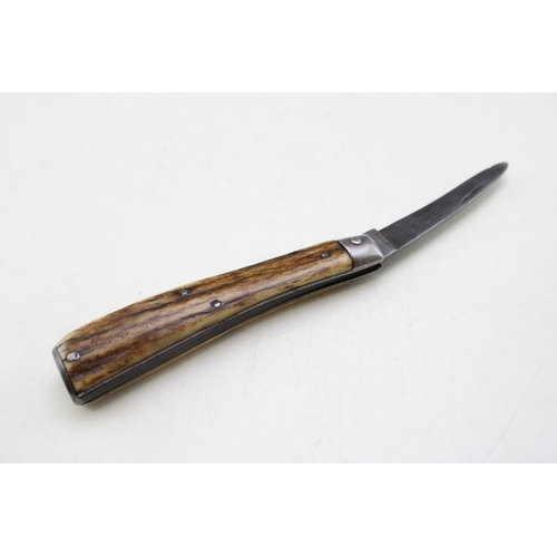 241 - A George Wostenholm IXL flat cap pruner pocket knife with stag antler handle, steel end cap, blade 6... 