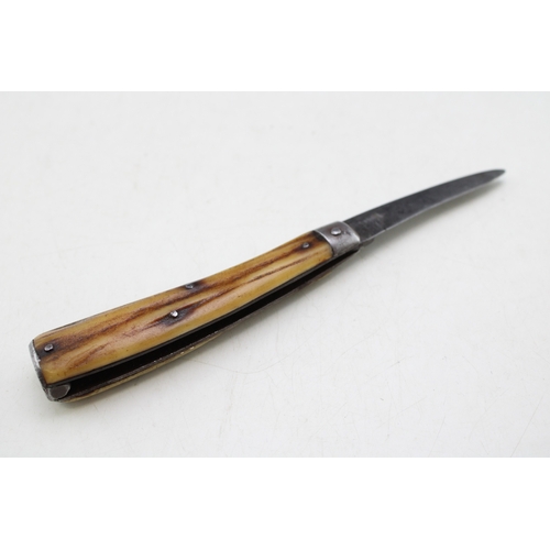 241 - A George Wostenholm IXL flat cap pruner pocket knife with stag antler handle, steel end cap, blade 6... 