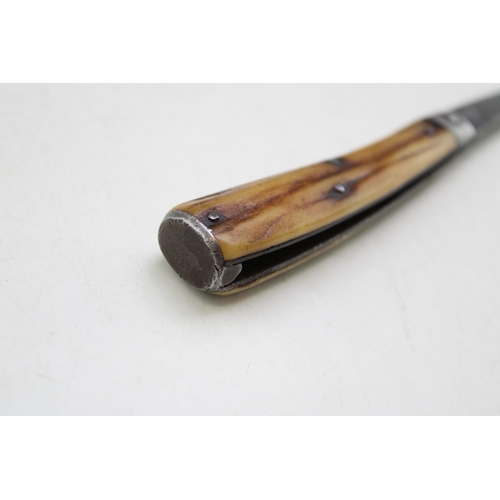 241 - A George Wostenholm IXL flat cap pruner pocket knife with stag antler handle, steel end cap, blade 6... 