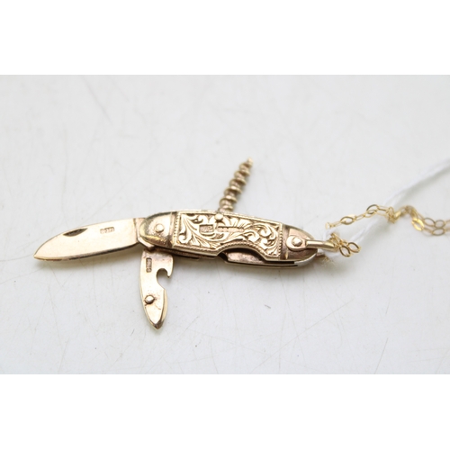 243 - 9ct gold miniature multitool pocketknife, Sheffield 1967, opening twin blade together with corkscrew... 