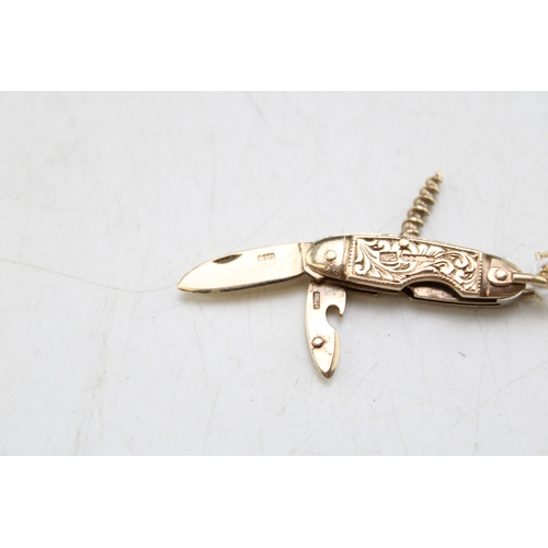 243 - 9ct gold miniature multitool pocketknife, Sheffield 1967, opening twin blade together with corkscrew... 