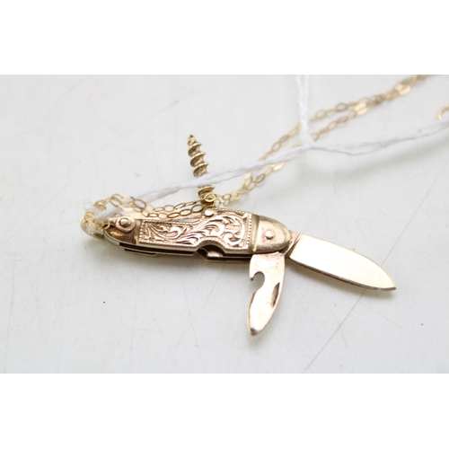 243 - 9ct gold miniature multitool pocketknife, Sheffield 1967, opening twin blade together with corkscrew... 