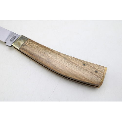 248 - A flat cap pruner pocket knife, by A Wright and Son of Sheffield, with olive wood handle, blade 7cm ... 