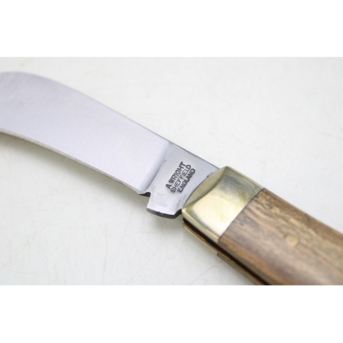 248 - A flat cap pruner pocket knife, by A Wright and Son of Sheffield, with olive wood handle, blade 7cm ... 