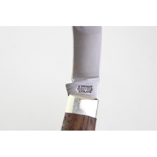 249 - A pruner pocket knife, by A Wright and Son of Sheffield, with wooden handle, blade 7cm long.