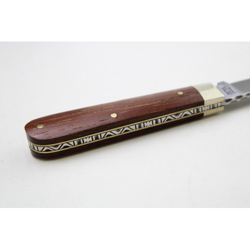 251 - A lambfoot pocket knife with traditional workback spring, by A Wright and Son of Sheffield, with woo... 