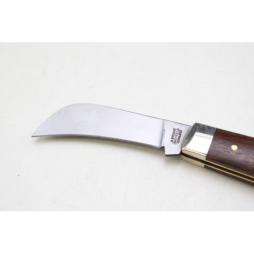 254 - A pruner pocket knife, by A Wright and Son of Sheffield, with wooden handle, blade 7cm long.