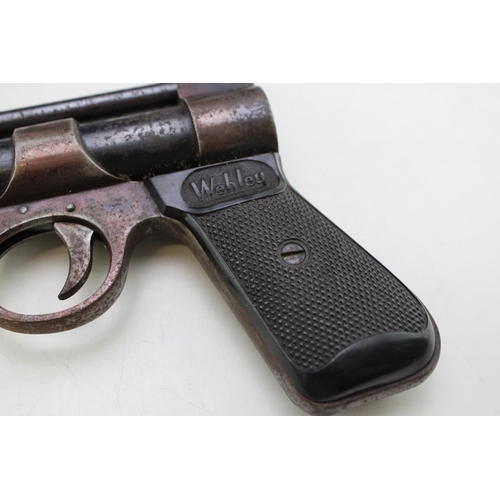 27 - Webley 'Junior' .177 air pistol, no. 635, 20cm, long, together with a brass spinner reel with horn h... 