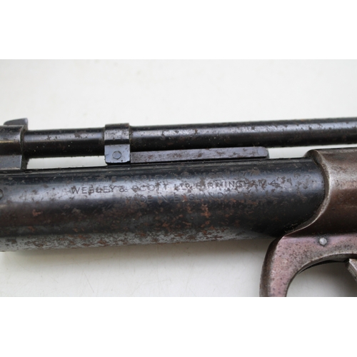 27 - Webley 'Junior' .177 air pistol, no. 635, 20cm, long, together with a brass spinner reel with horn h... 