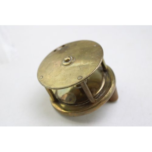 27 - Webley 'Junior' .177 air pistol, no. 635, 20cm, long, together with a brass spinner reel with horn h... 