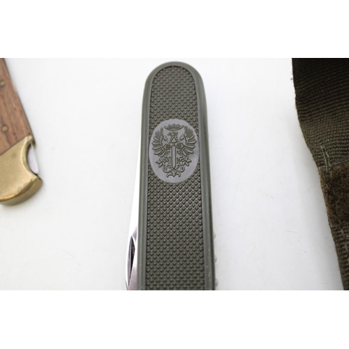 33 - A Collection of Modern Folding Pocket Knives including Three Lock Knives a folding Army Knife & one ... 
