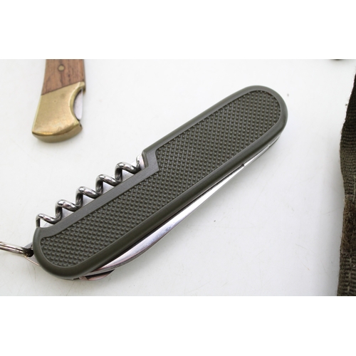 33 - A Collection of Modern Folding Pocket Knives including Three Lock Knives a folding Army Knife & one ... 