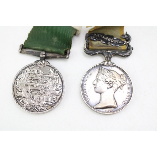 55 - Two 19th Victorian Medals including a Crimea 1854 Medal with a For Long Service in the Volunteer For... 