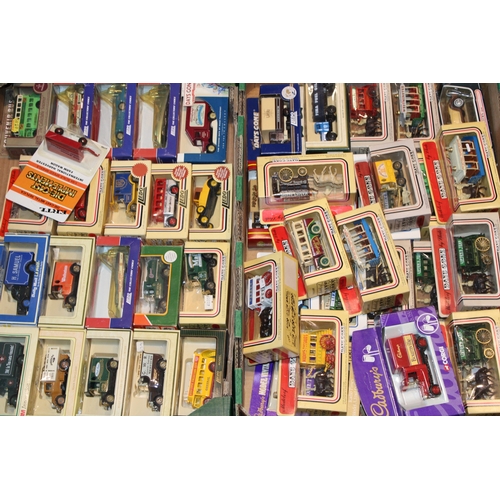 83 - A large collection of boxed vintage die-cast vehicles to include Lledo and Days Gone, Ertl Die-Cast ... 