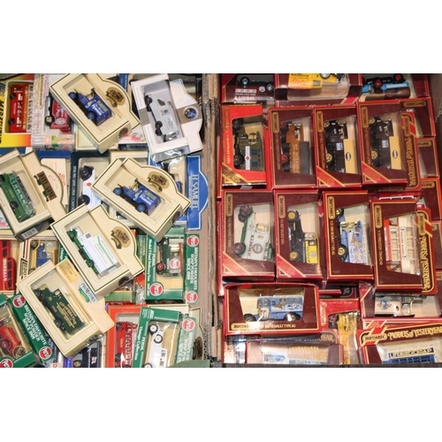 84 - A large collection of boxed vintage die-cast vehicles to include Lledo and Days Gone, together with ... 