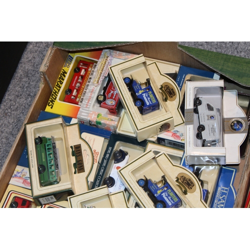 84 - A large collection of boxed vintage die-cast vehicles to include Lledo and Days Gone, together with ... 