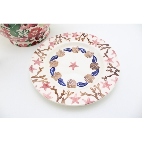 16 - Emma Bridgewater to include a 6 pint jug in the Zinnias pattern, a sample 8.5'' Shells pattern plate... 